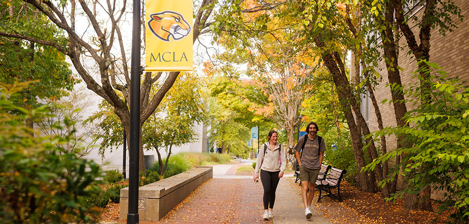 MCLA students walking across campus in fall