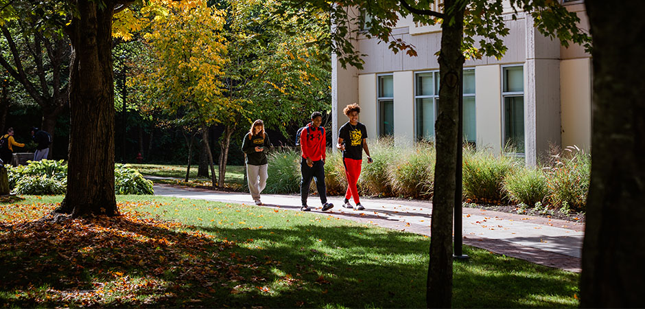 MCLA students walking across campus in summer