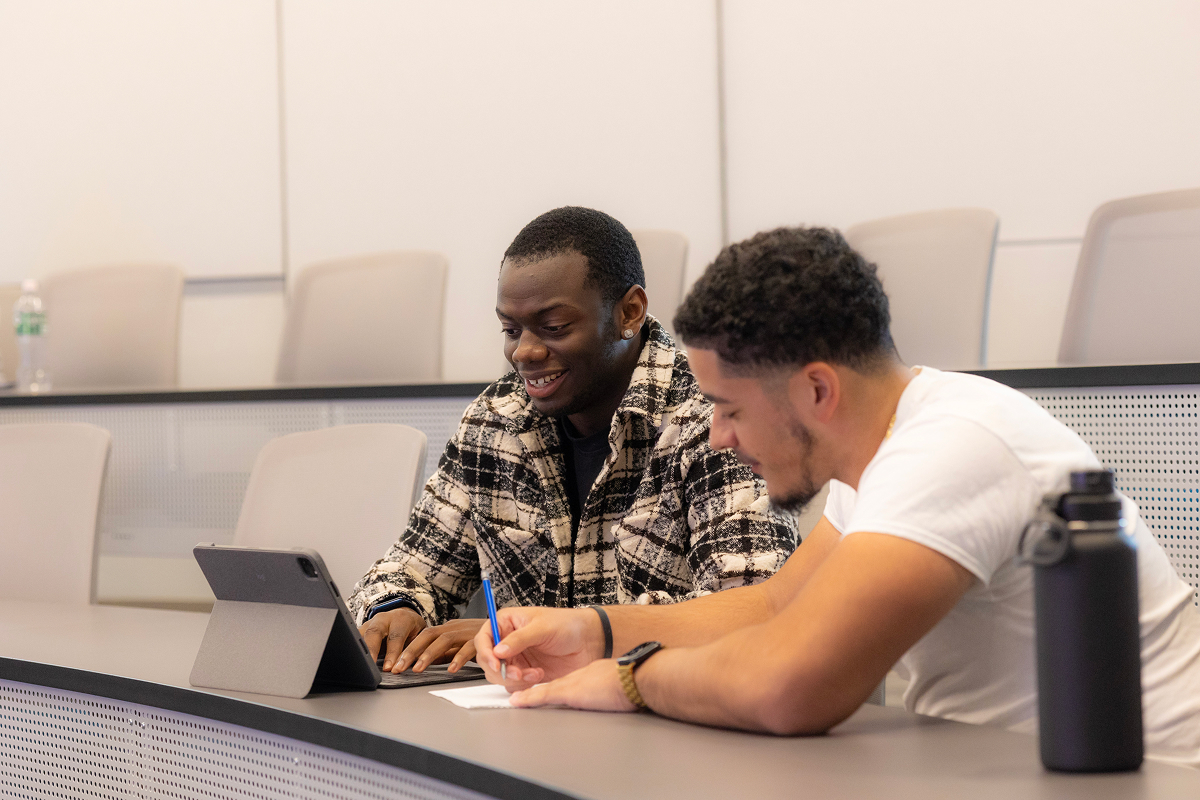 Pair of students in lecture hall